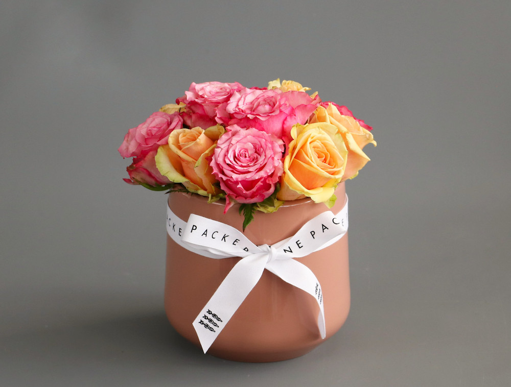 Coral Ceramic Pot Flower Arrangement by Jane Packer Flowers